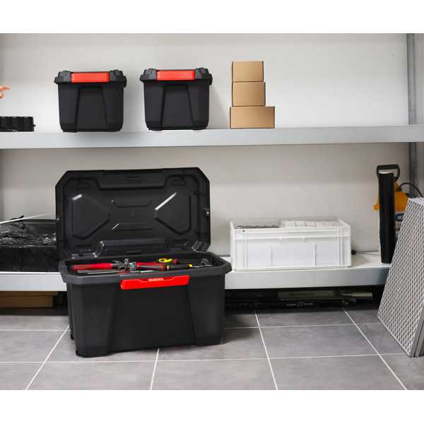 Caisse de rangement solide noire avec roulettes 70 litres